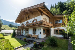 Гостиница Ferienwohnungen Sonnrain 13, Леоганг